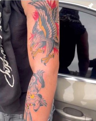 Color traditional eagle tattoo on forearm by Aaron Raines