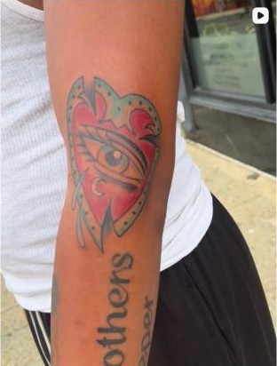Color traditional heart tattoo with eye design and lettering, by Aaron Raines