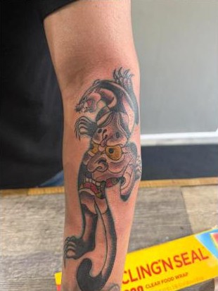 Color traditional cat tattoo by Aaron Raines