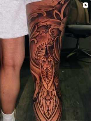 Black and grey ornamental filigree thigh tattoo by Thelmo