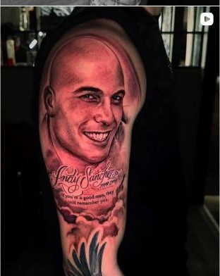 Black and grey memorial portrait tattoo with script lettering, by Thelmo