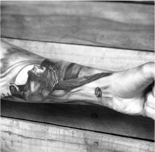 Black and grey religious figure forearm tattoo by Thelmo