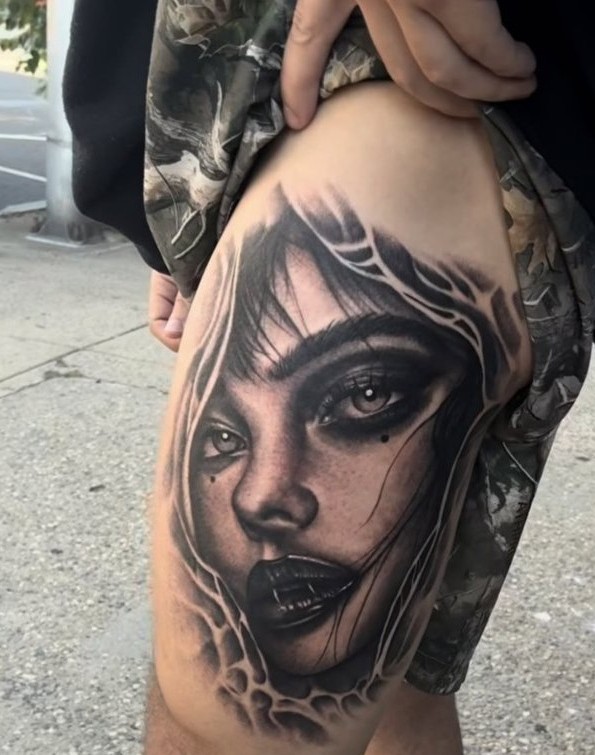 Woman's portrait thigh piece by Mike